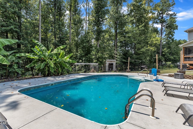 1725 River Club Way, Franklinton, NC 27525 - view of pool featuring a patio area, a fenced backyard, and view of wooded area