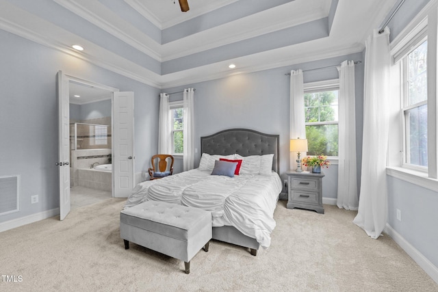 5005 Clyden Cv, Raleigh, NC 27612 - carpeted bedroom with multiple windows, ornamental molding, ensuite bathroom, and recessed lighting