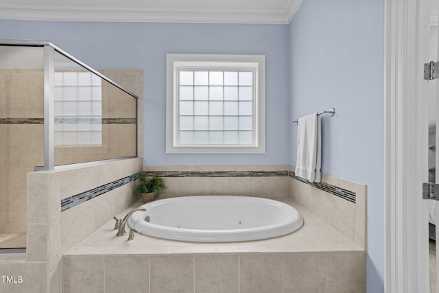 5005 Clyden Cv, Raleigh, NC 27612 - bathroom featuring a jetted tub, tiled shower, and crown molding