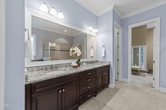 5005 Clyden Cv, Raleigh, NC 27612 - bathroom featuring double vanity, a shower stall, tile patterned flooring, and crown molding