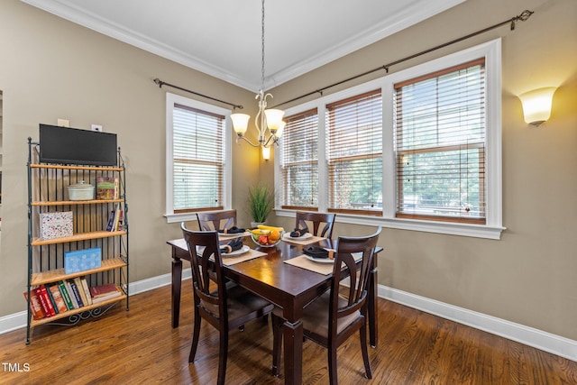 5005 Clyden Cv, Raleigh, NC 27612 - dining area with a chandelier, wood finished floors, and ornamental molding