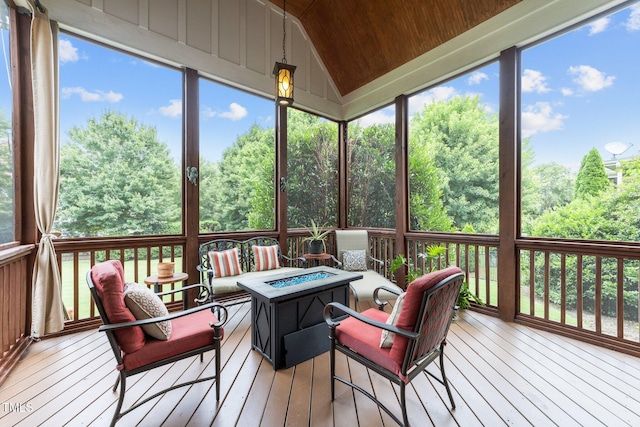 5005 Clyden Cv, Raleigh, NC 27612 - sunroom featuring an outdoor fire pit and vaulted ceiling