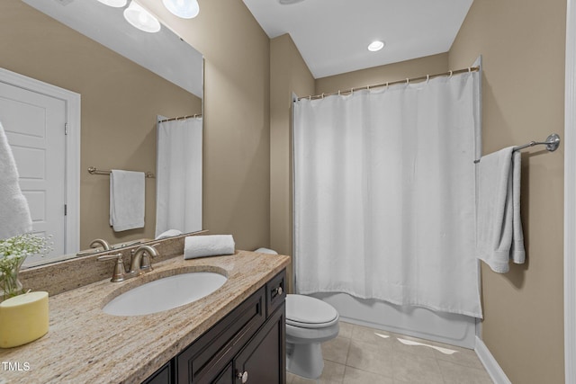 5005 Clyden Cv, Raleigh, NC 27612 - bathroom featuring vanity, tile patterned floors, and shower / bathtub combination with curtain