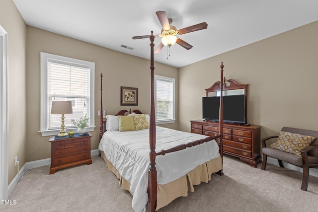 5005 Clyden Cv, Raleigh, NC 27612 - bedroom featuring light carpet and a ceiling fan