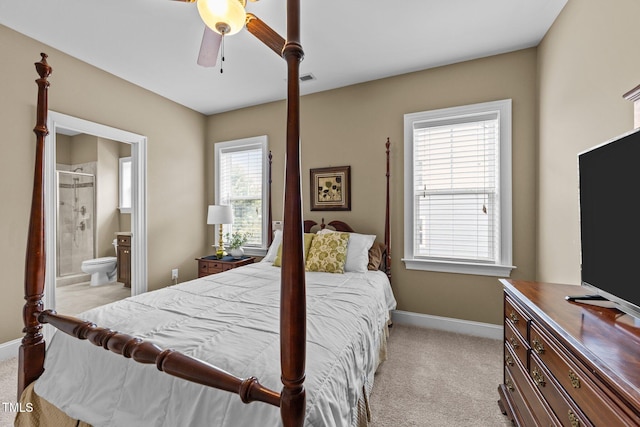 5005 Clyden Cv, Raleigh, NC 27612 - bedroom featuring light colored carpet, connected bathroom, and ceiling fan