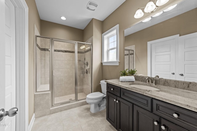5005 Clyden Cv, Raleigh, NC 27612 - bathroom with tile patterned floors, a shower stall, and vanity