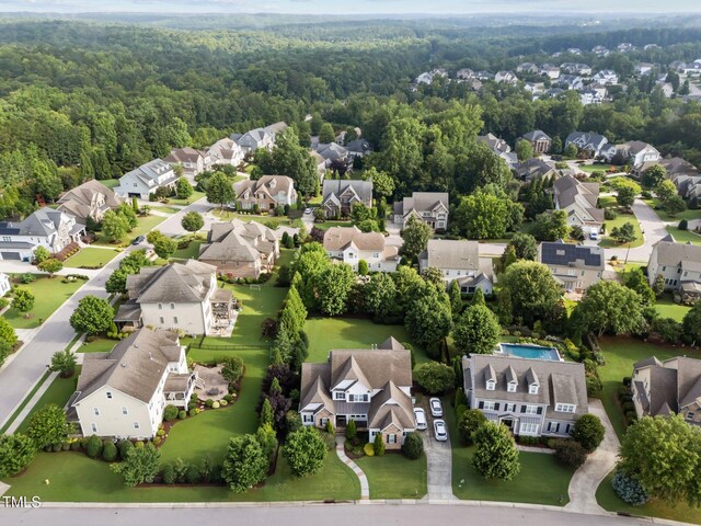 5005 Clyden Cv, Raleigh, NC 27612 - aerial perspective of suburban area with a forest