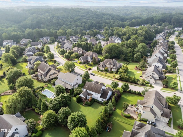 5005 Clyden Cv, Raleigh, NC 27612 - aerial view of residential area with a heavily wooded area