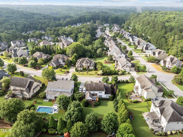 5005 Clyden Cv, Raleigh, NC 27612 - aerial perspective of suburban area featuring a forest