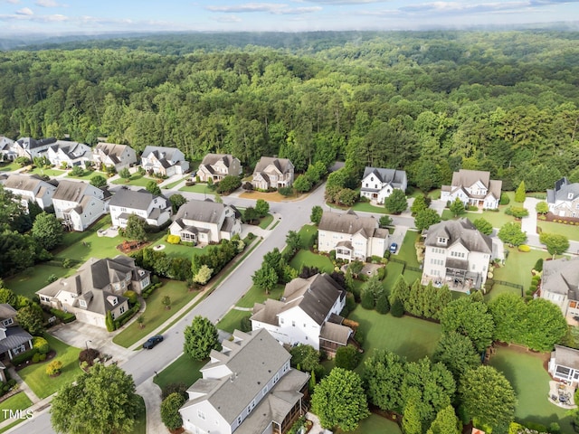 5005 Clyden Cv, Raleigh, NC 27612 - aerial perspective of suburban area featuring a heavily wooded area