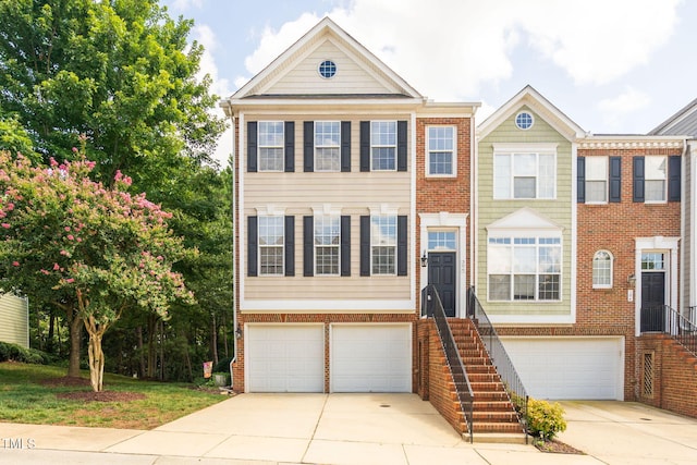 306 Kirkeenan Cir, Morrisville, NC 27560 - colonial inspired home with driveway, brick siding, and a garage
