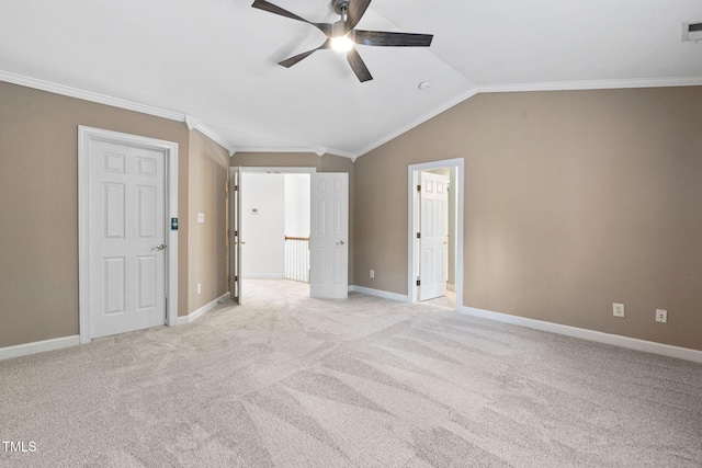 306 Kirkeenan Cir, Morrisville, NC 27560 - unfurnished bedroom featuring crown molding, vaulted ceiling, light colored carpet, ensuite bath, and ceiling fan