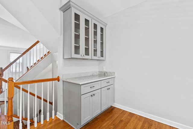 306 Kirkeenan Cir, Morrisville, NC 27560 - bar with wood finished floors and stairway