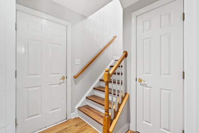 306 Kirkeenan Cir, Morrisville, NC 27560 - stairs featuring wood finished floors and baseboards