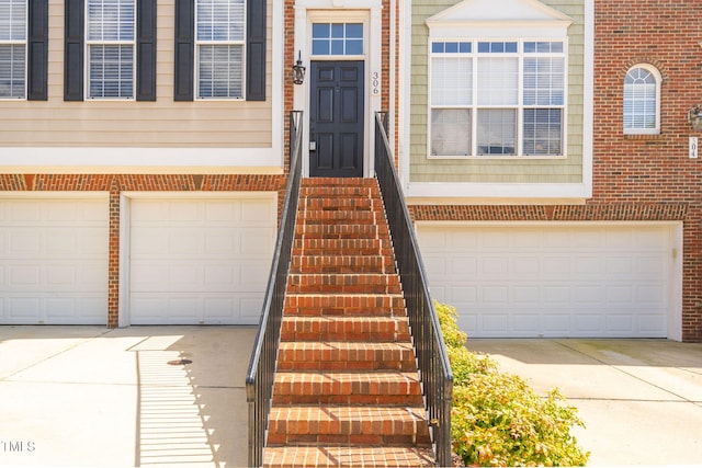 306 Kirkeenan Cir, Morrisville, NC 27560 - doorway to property with driveway and an attached garage