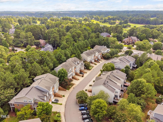 306 Kirkeenan Cir, Morrisville, NC 27560 - aerial perspective of suburban area featuring a heavily wooded area