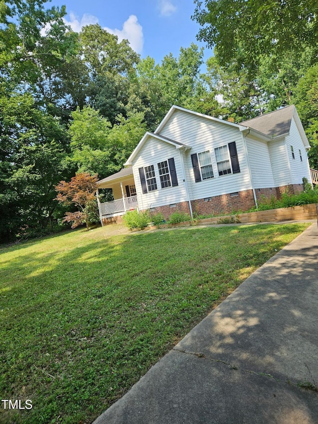 7472 Cypress Dr, Graham, NC 27253 - ranch-style home with crawl space, a front yard, and covered porch