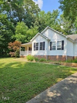 7472 Cypress Dr, Graham, NC 27253 - view of front facade with a front lawn and a porch