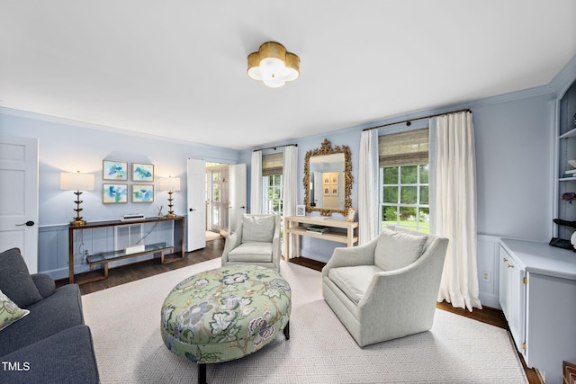 809 Blenheim Dr, Raleigh, NC 27612 - living room with plenty of natural light, wood finished floors, and crown molding