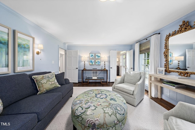 809 Blenheim Dr, Raleigh, NC 27612 - living room featuring wood finished floors and crown molding