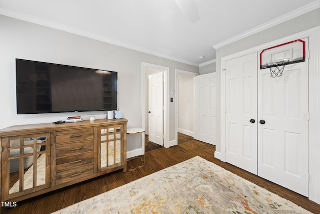 809 Blenheim Dr, Raleigh, NC 27612 - bedroom featuring ornamental molding, wood finished floors, and a closet
