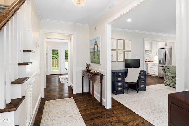 809 Blenheim Dr, Raleigh, NC 27612 - entryway with dark wood-style floors, crown molding, and recessed lighting