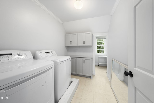 809 Blenheim Dr, Raleigh, NC 27612 - laundry area featuring washing machine and clothes dryer, crown molding, and cabinet space