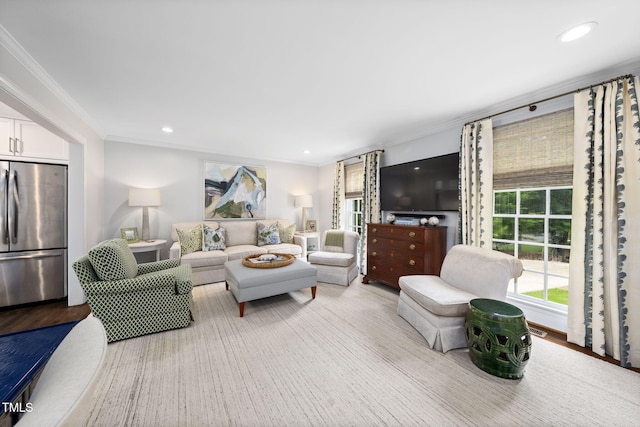 809 Blenheim Dr, Raleigh, NC 27612 - living area with ornamental molding, recessed lighting, and wood finished floors