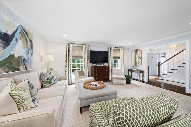 809 Blenheim Dr, Raleigh, NC 27612 - living room featuring ornamental molding, recessed lighting, stairs, and wood finished floors