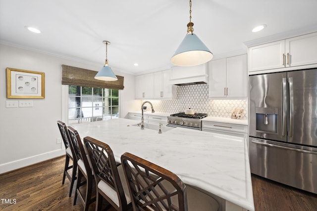 809 Blenheim Dr, Raleigh, NC 27612 - kitchen with appliances with stainless steel finishes, dark wood-style flooring, ornamental molding, backsplash, and white cabinets