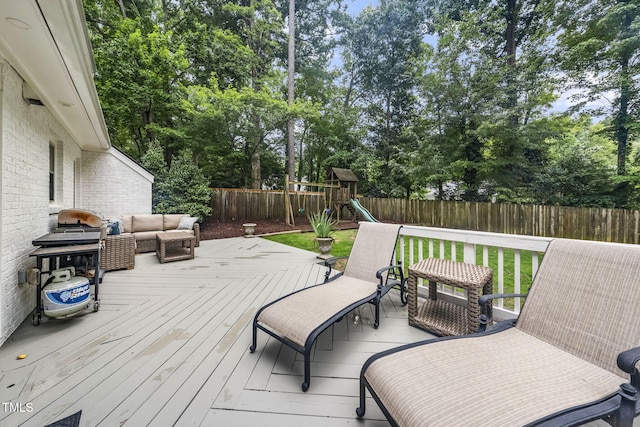 809 Blenheim Dr, Raleigh, NC 27612 - wooden deck with a fenced backyard, a playground, view of wooded area, and outdoor lounge area