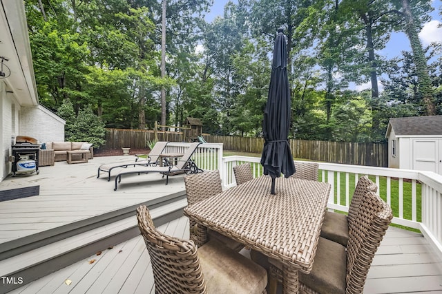 809 Blenheim Dr, Raleigh, NC 27612 - wooden deck with a fenced backyard, a storage unit, an outdoor hangout area, and view of wooded area
