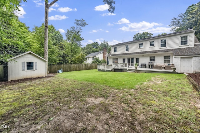 809 Blenheim Dr, Raleigh, NC 27612 - rear view of property featuring outdoor lounge area, a deck, and brick siding