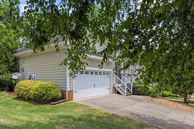 49 Brookridge Ct, Pittsboro, NC 27312 - view of property exterior featuring driveway and a lawn