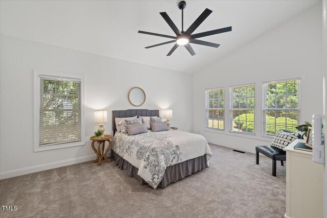 49 Brookridge Ct, Pittsboro, NC 27312 - bedroom featuring multiple windows, carpet flooring, high vaulted ceiling, and ceiling fan