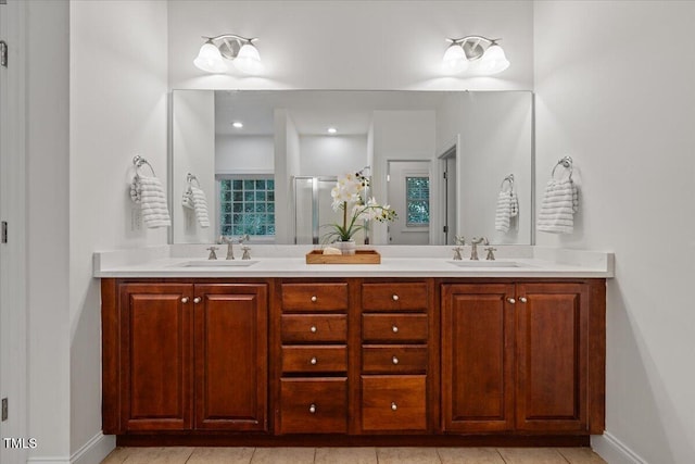 49 Brookridge Ct, Pittsboro, NC 27312 - full bathroom with double vanity, a stall shower, and tile patterned flooring
