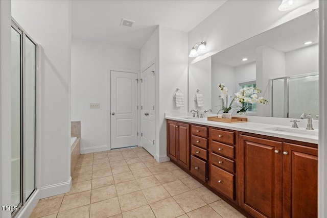 49 Brookridge Ct, Pittsboro, NC 27312 - full bathroom with a shower stall, double vanity, tile patterned floors, and a garden tub