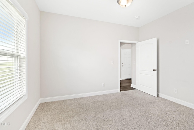 6531 Knob Creek Dr, Whitsett, NC 27377 - empty room featuring carpet floors and baseboards