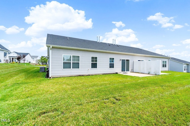 6531 Knob Creek Dr, Whitsett, NC 27377 - back of house with a patio area and a yard