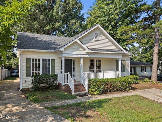 305 Justice Heights St, Apex, NC 27502 - bungalow-style house with a porch and a shingled roof