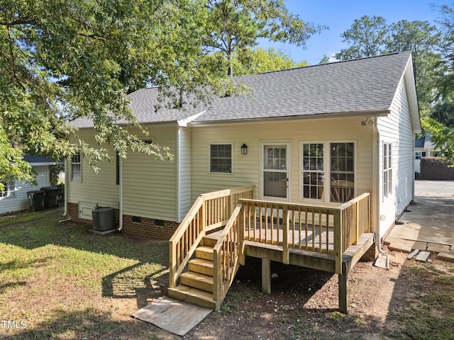 305 Justice Heights St, Apex, NC 27502 - back of house with a shingled roof, crawl space, a wooden deck, and a lawn