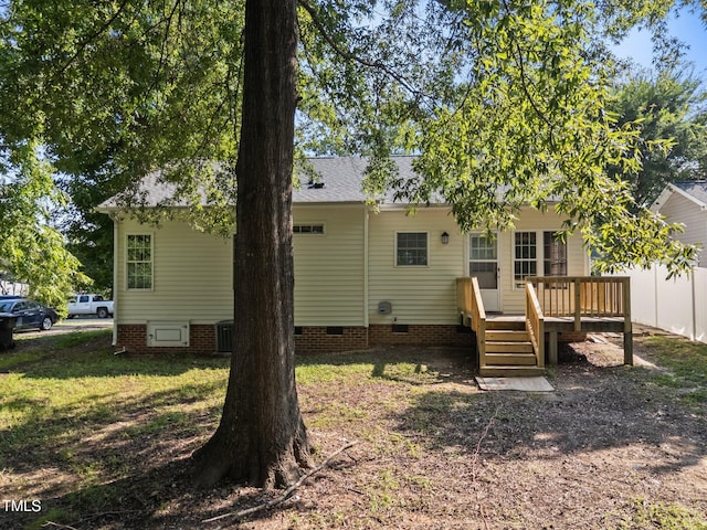 305 Justice Heights St, Apex, NC 27502 - back of property featuring crawl space, a deck, and a yard