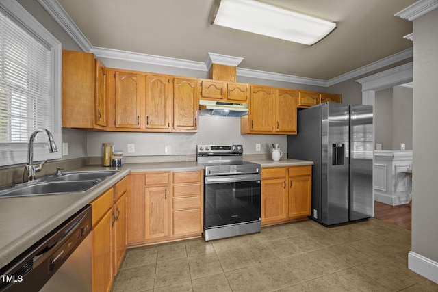 305 Justice Heights St, Apex, NC 27502 - kitchen featuring appliances with stainless steel finishes, under cabinet range hood, ornamental molding, light countertops, and light tile patterned floors