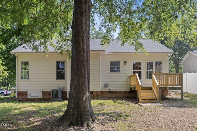 305 Justice Heights St, Apex, NC 27502 - back of property with crawl space and a wooden deck