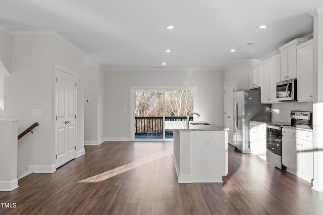 5332 River Reach Dr, Raleigh, NC 27616 - kitchen with appliances with stainless steel finishes, dark wood-style flooring, white cabinetry, an island with sink, and crown molding