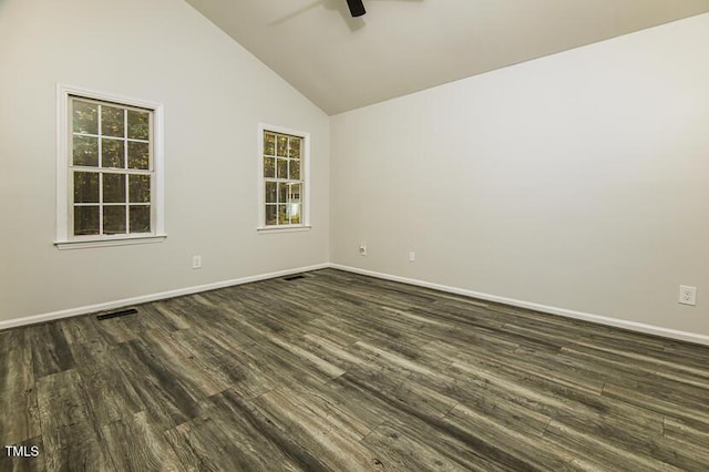 190 Hardwood Dr, Franklinton, NC 27525 - empty room featuring a ceiling fan, dark wood finished floors, and vaulted ceiling