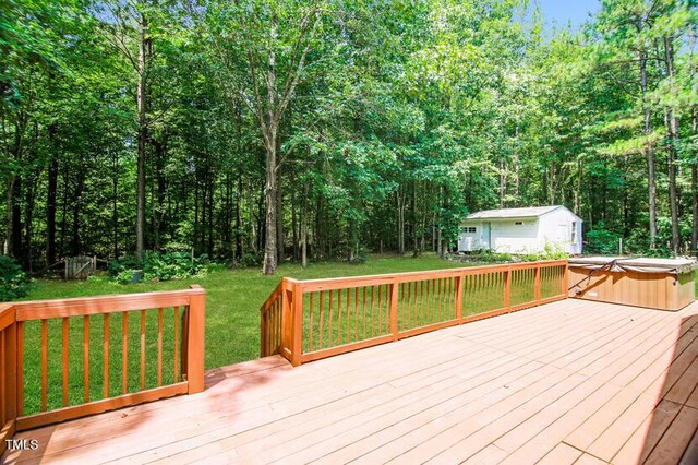 190 Hardwood Dr, Franklinton, NC 27525 - wooden terrace with a yard and a hot tub