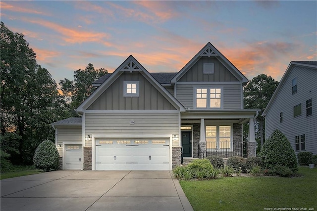 1234 Micahs Way N, Spring Lake, NC 28390 - craftsman house featuring a porch, stone siding, board and batten siding, and concrete driveway
