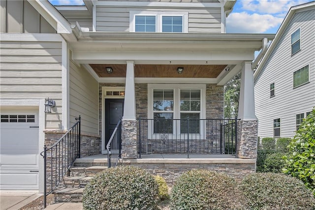 1234 Micahs Way N, Spring Lake, NC 28390 - property entrance with stone siding and covered porch