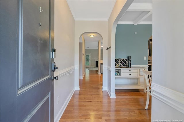 1234 Micahs Way N, Spring Lake, NC 28390 - entryway with arched walkways, light wood-style floors, and ornamental molding